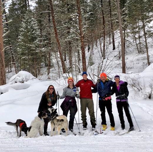 Professor Sandra Zellmer (far right) conducting “case rounds” with her clinic students Oliver Wood, Lowell Chandler, Molly Kelly, and Molly Woodman (right to left) in the Rattlesnake Wilderness.