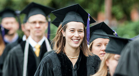 Hannah Cail '16 and fellow students walk to graduation.