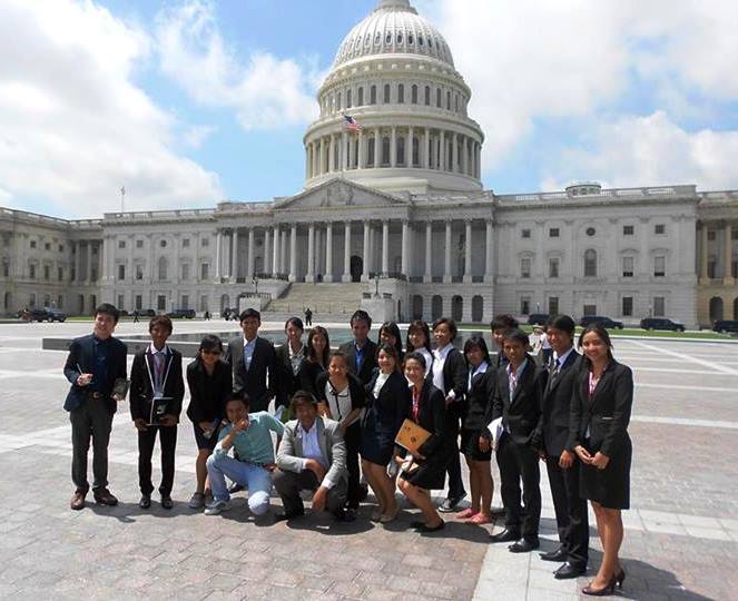 Male and female SUSI participants from Southeast Asia pose in front of the Congressional Building in Washington, DC