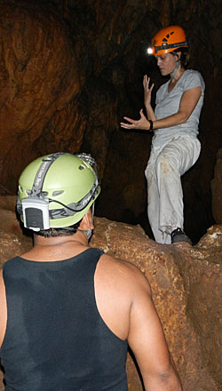 UM Professor Ashley McKeown (top) and Belizean archaeologist Gonzalo Pleitez work in a Central American cavern. (Photo by Kirsten Green)