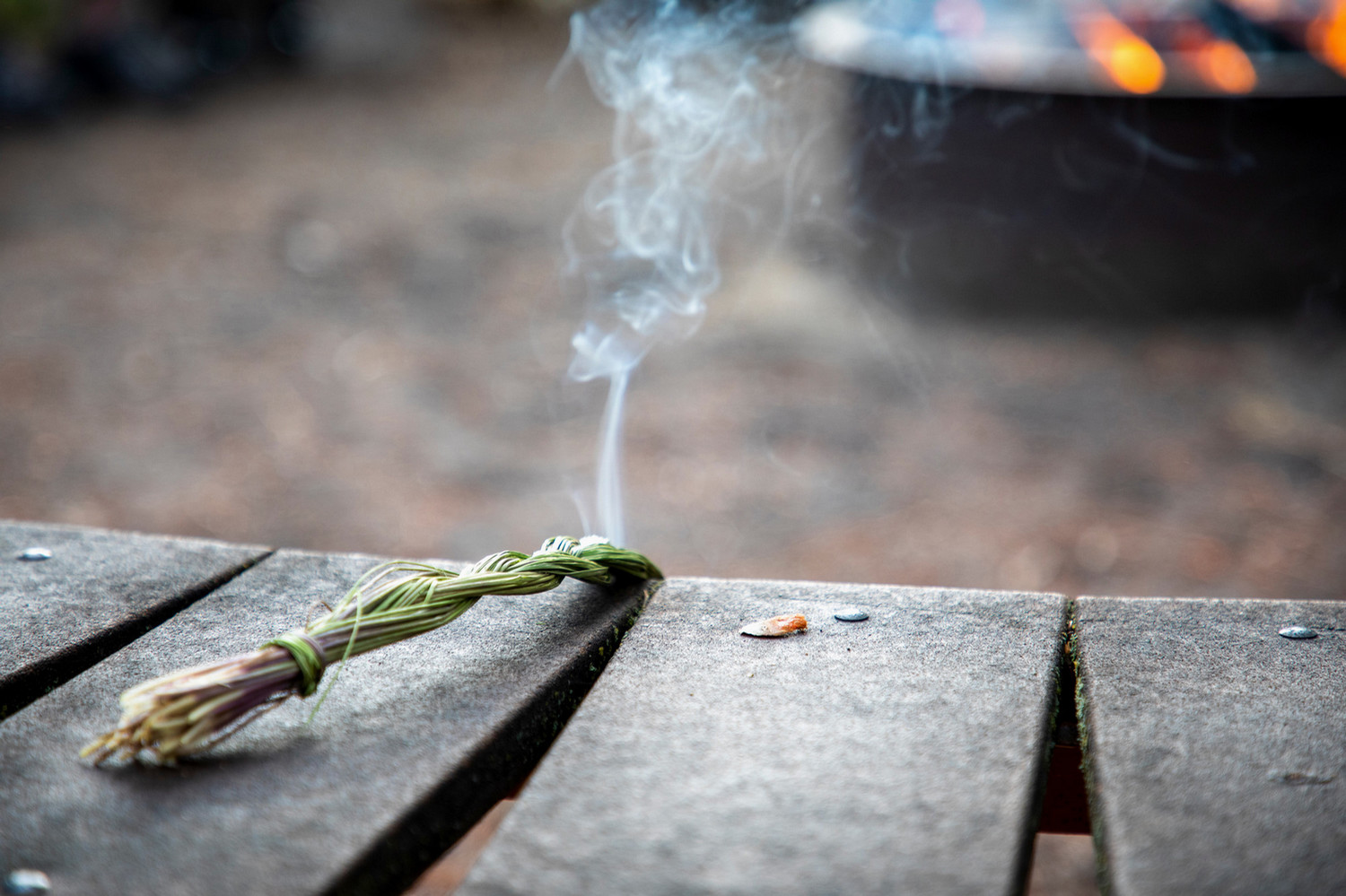 burning sweetgrass with smoke rising