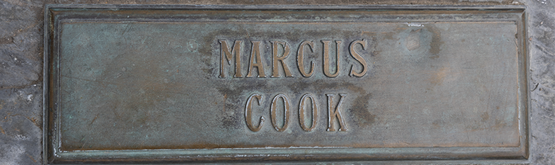 Photo of Marcus Cooks name marker.