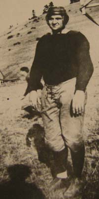 Dornblaser in football gear at UM, 1913.