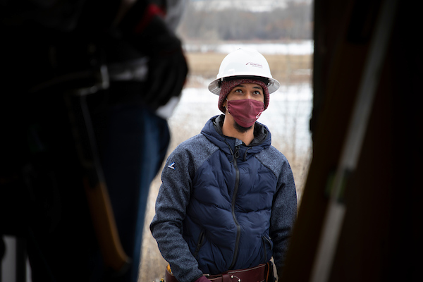 Student Insight. Missoula College student Alex Fair paying listening to instructor.