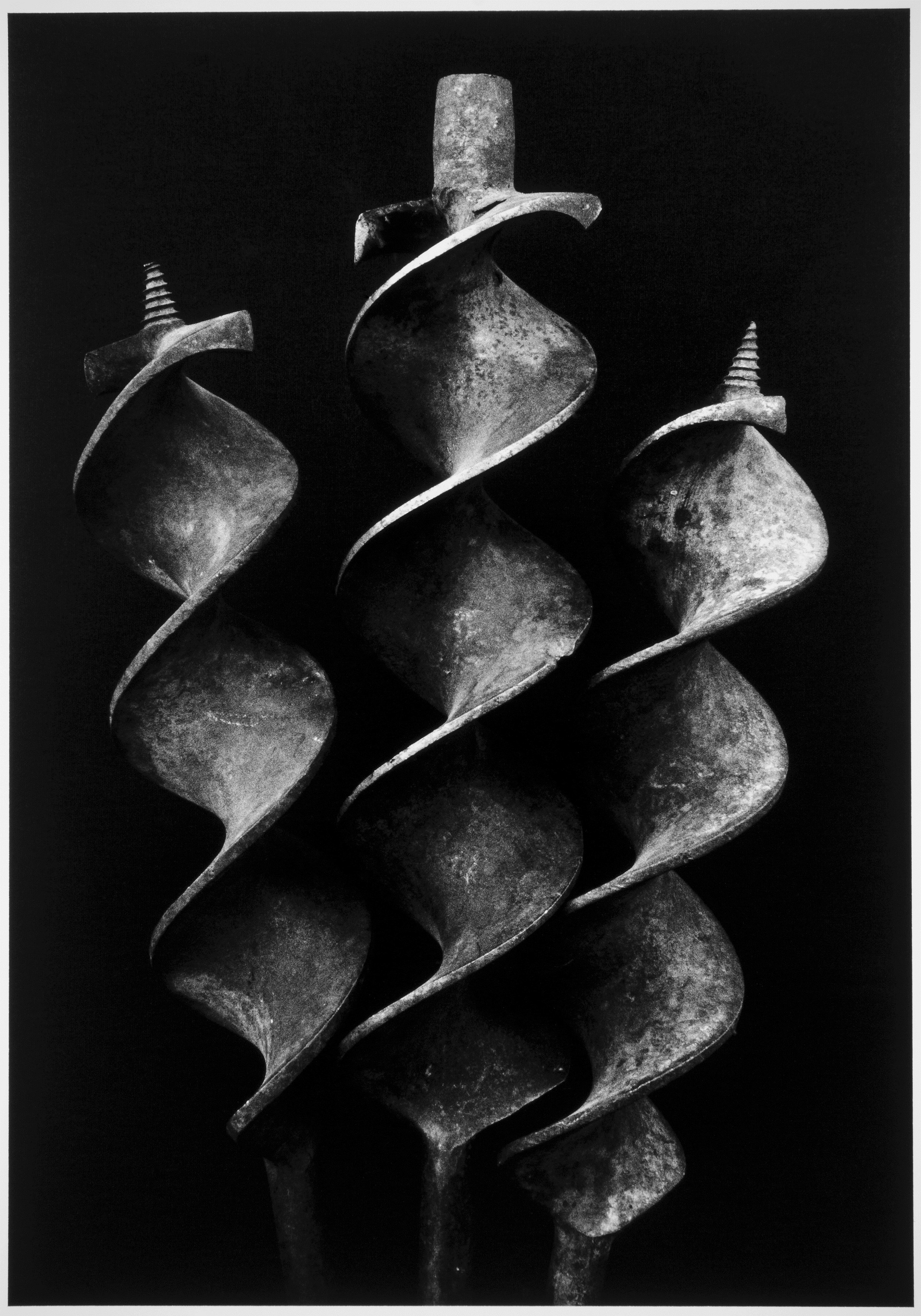 black and white photograph of three drill bites by richard s buswell