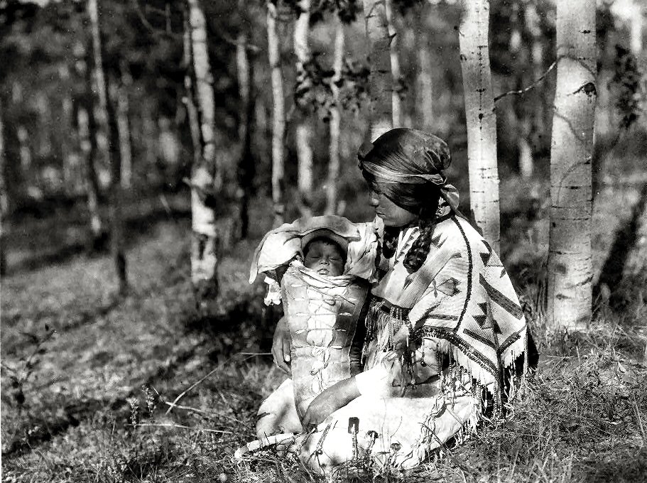 Assiniboine woman with her child