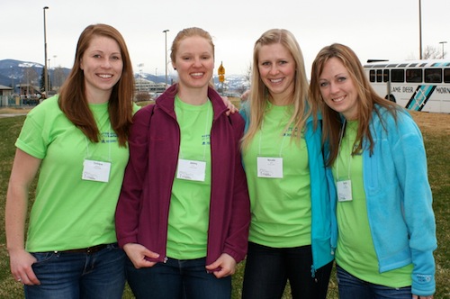 fours stundets posing for group photo