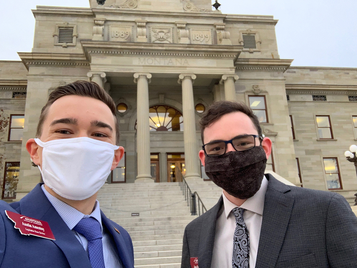 Photo of two journalism studenst who cover Legislature
