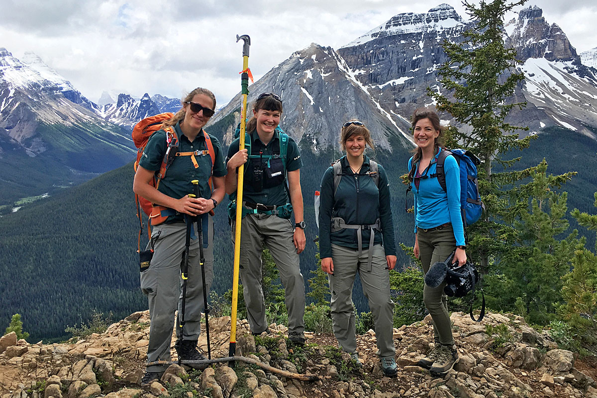 “Ghost Forests” producer Breanna McCabe (far right) stops to smile alongside Parks Canada whitebark pine specialists Laura Kroesen, Megan Kinley and Roslyn Johnson on Paget Peak.