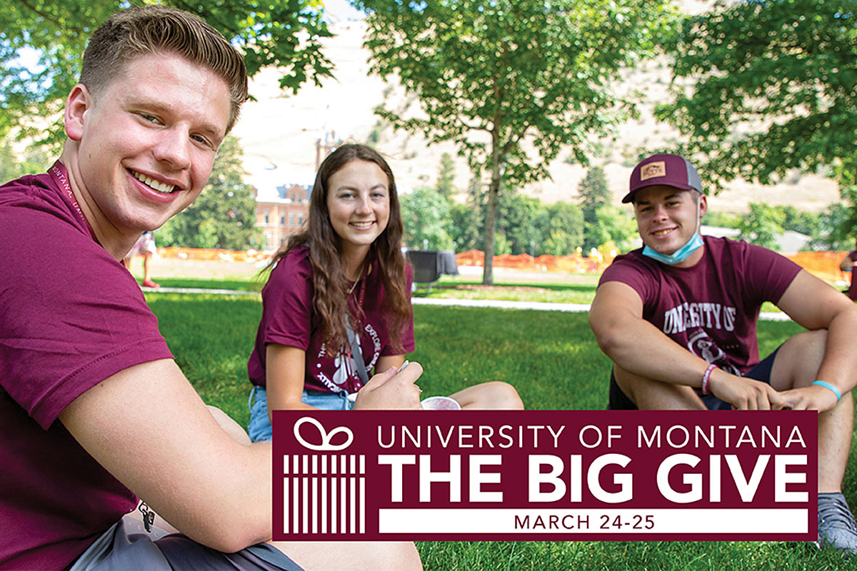Students smile on the grass at UM for an ad that says The Big Give, March 24-25.