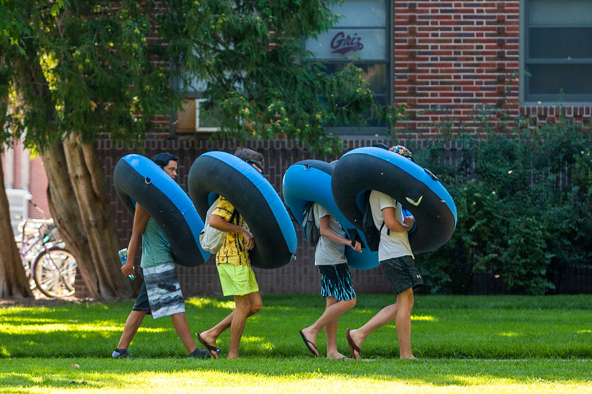 Floaters cross UM’s campus bound for the Clark Fork River.