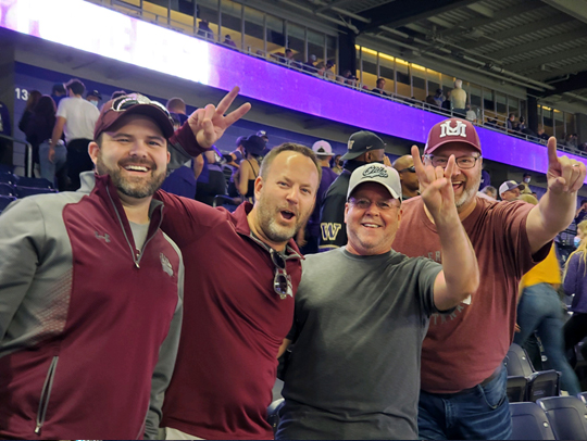 Four Montana fans at the Grizzlies-Huskies football game last Saturday 