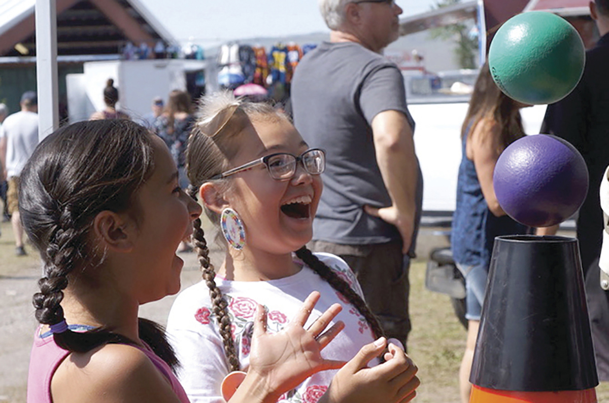 Photo of two girls at science fair