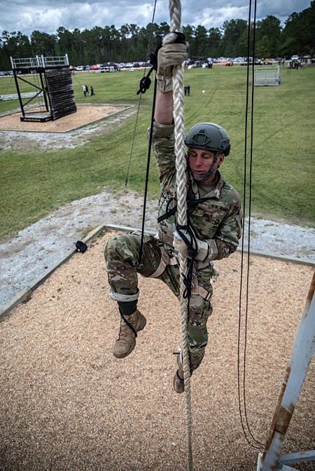 UM graduate student Maj. Michael Blanchard climbs during the recent Best Ranger Competition in Fort Benning, Georgia. 