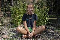 Photo of Rianna Bowers in firewise garden