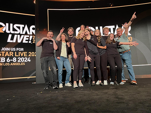 Photo of students on conference stage