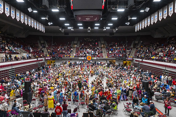 A picture of a grand entry from the 2022 Kyiyo Pow Wow.