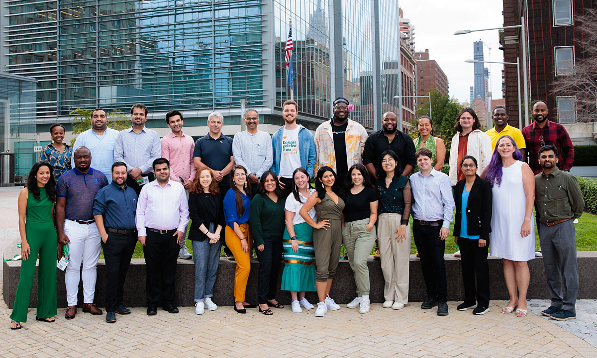 The 31 winners of the Solve Global Challenge pose for a photo.
