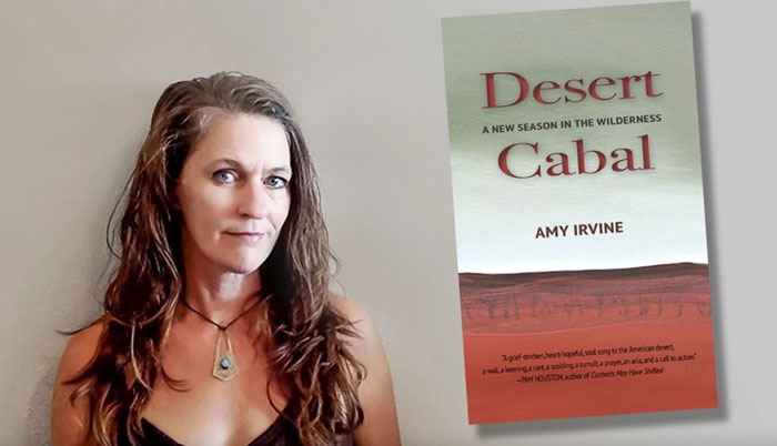 Amy Irvine poses with her book Desert Cabal.