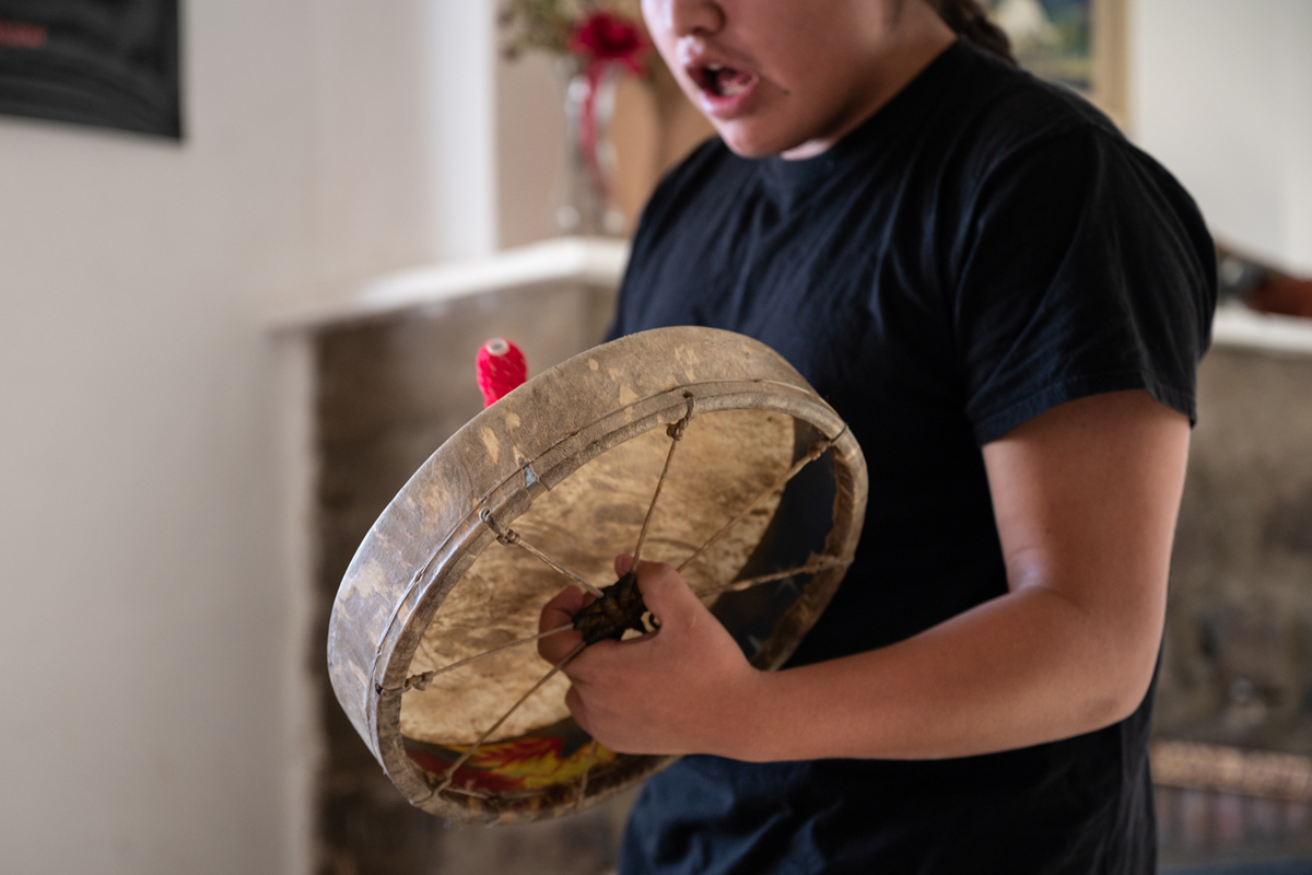 An image of someone banging a drum. 