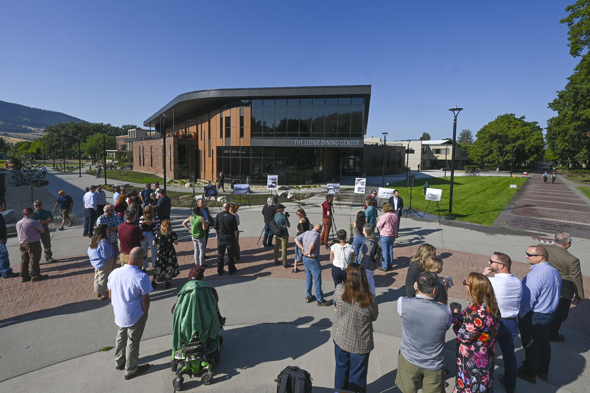 A group gathers for the grand opening of UM’s new dining hall, The Lodge.