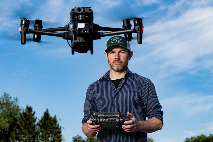 Sarmento flies a drone.