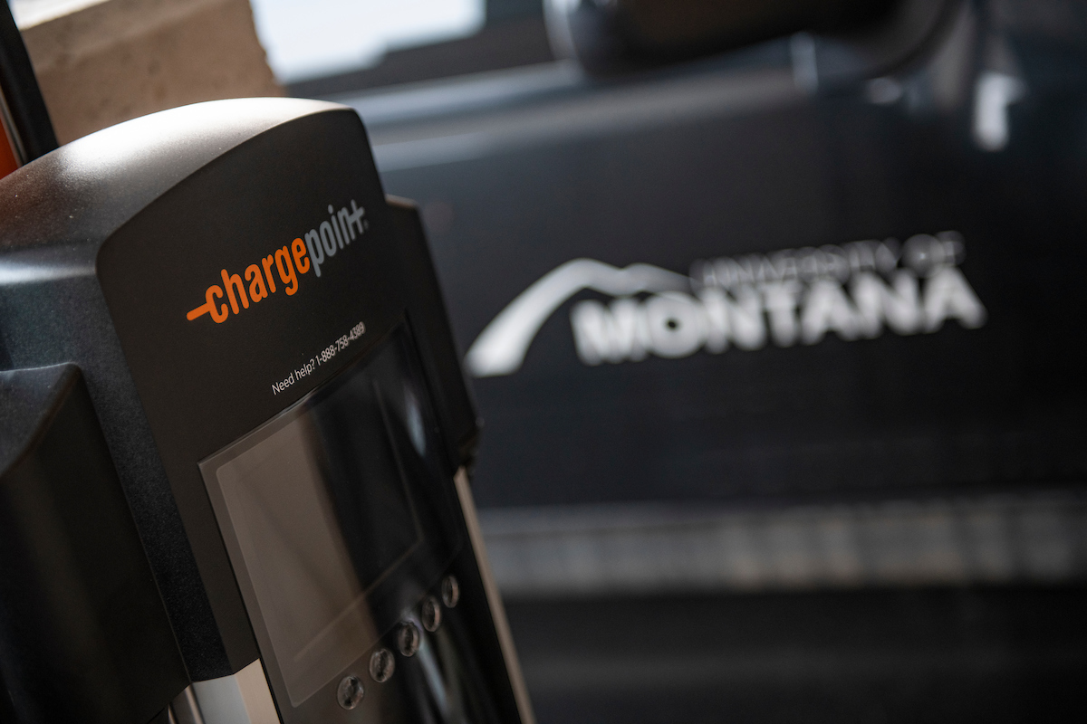 An electric car charger on campus 