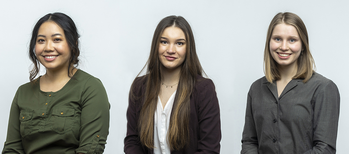 Three UM female rising seniors. There are three portraits in a row.