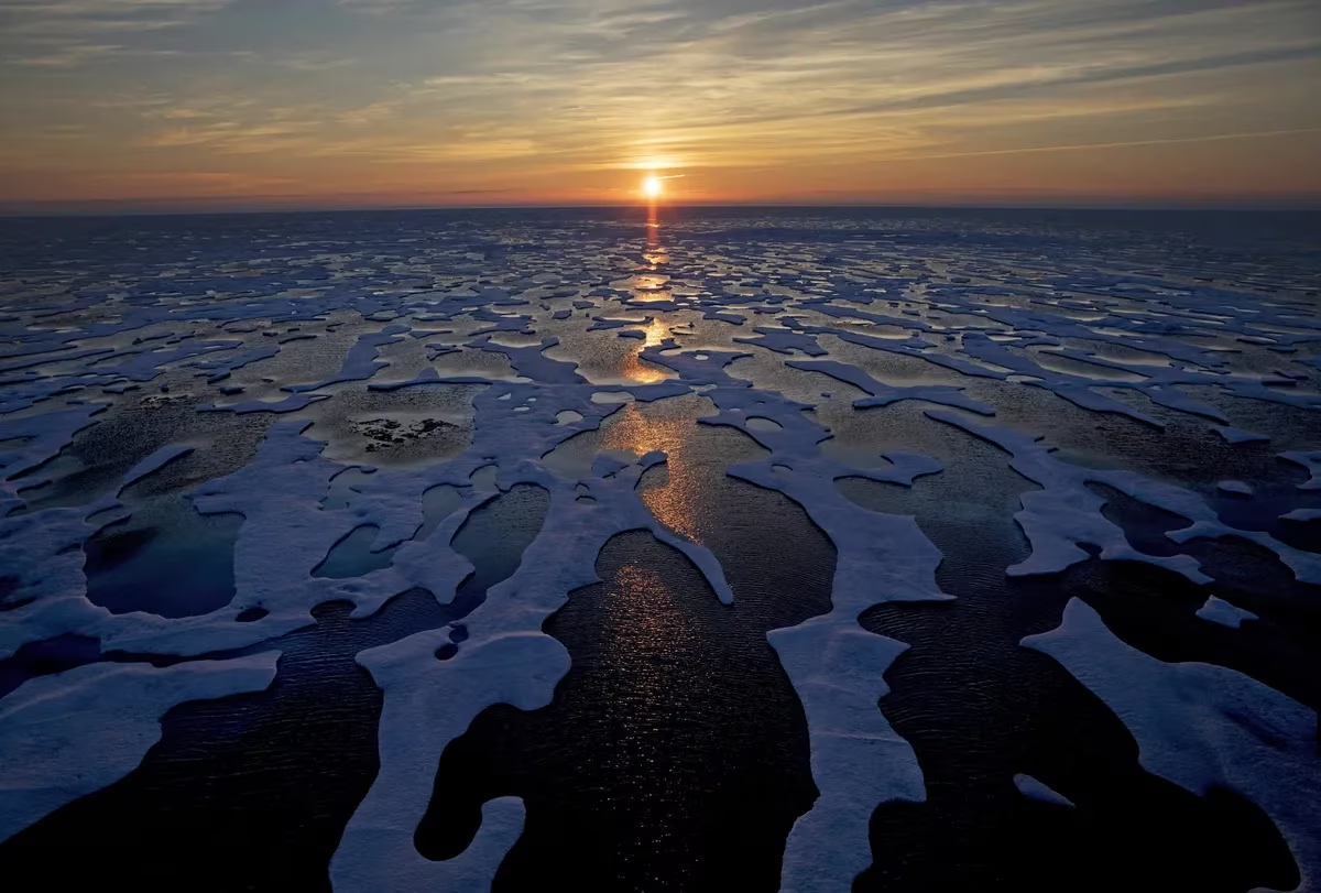 Midnight sun across sea ice in the Northwest Passage July 22, 2017. David Goldman/AP