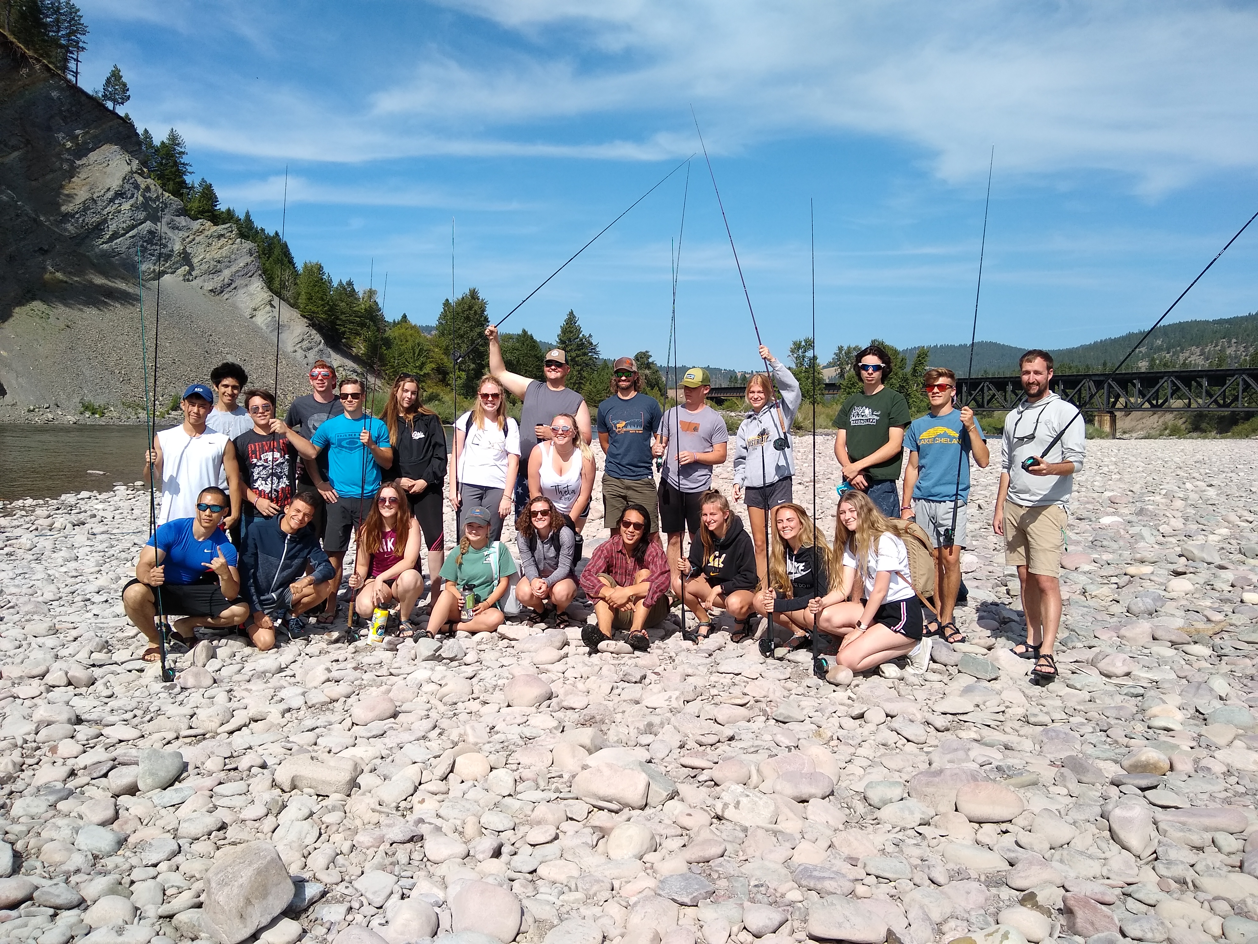 group of students with fly fishing gear