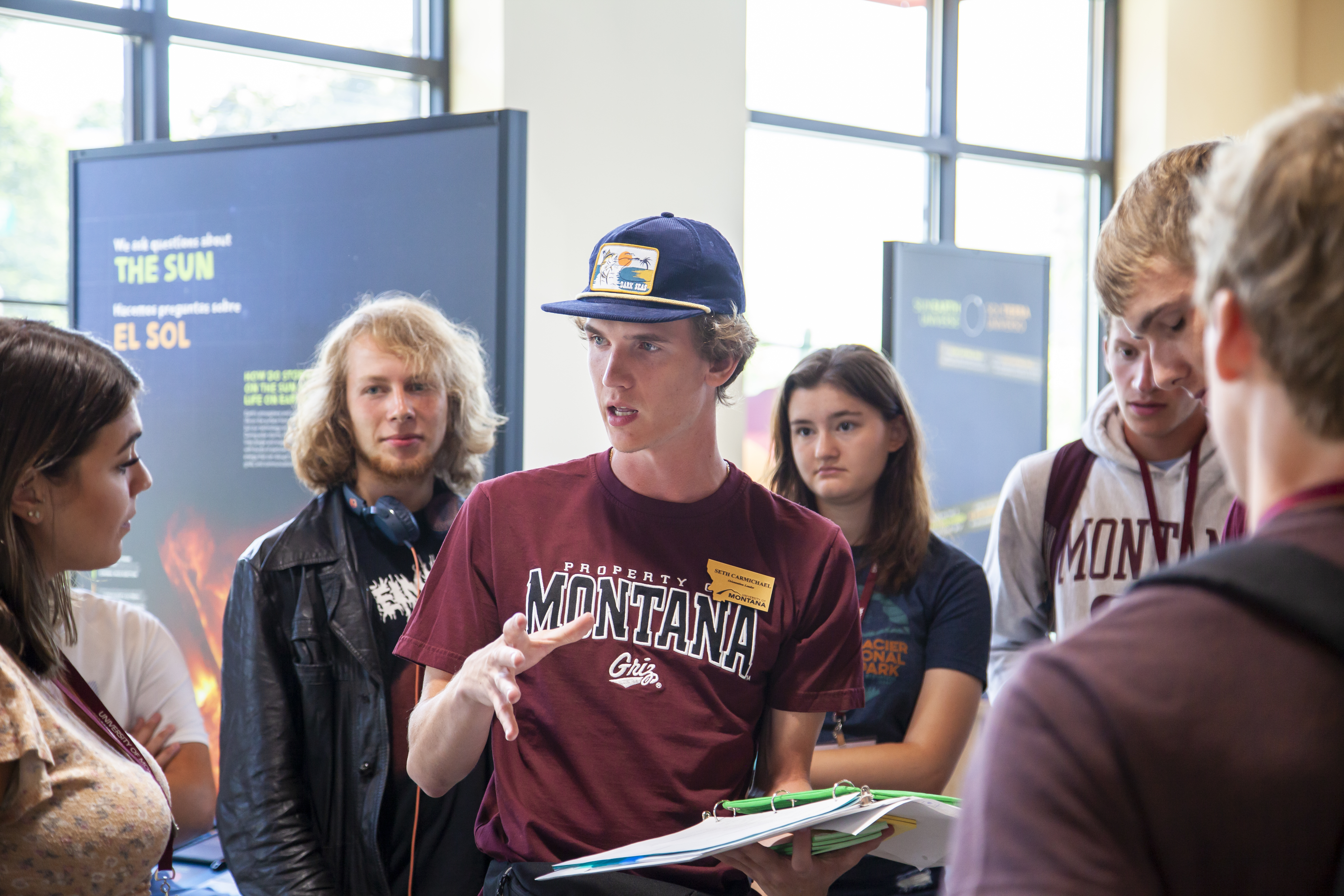 UM student leads group of new freshman at their Big Sky Experience at SpectrUM Discovery Area in 2019