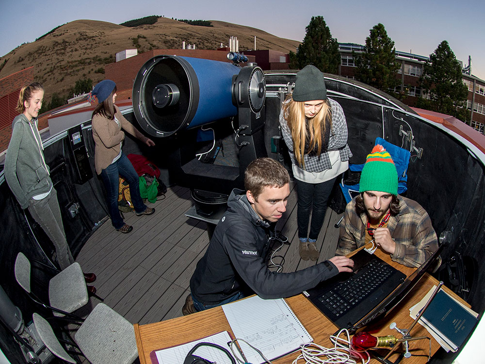 Students using a telescope
