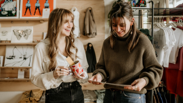 two women reviewing a report in a small business