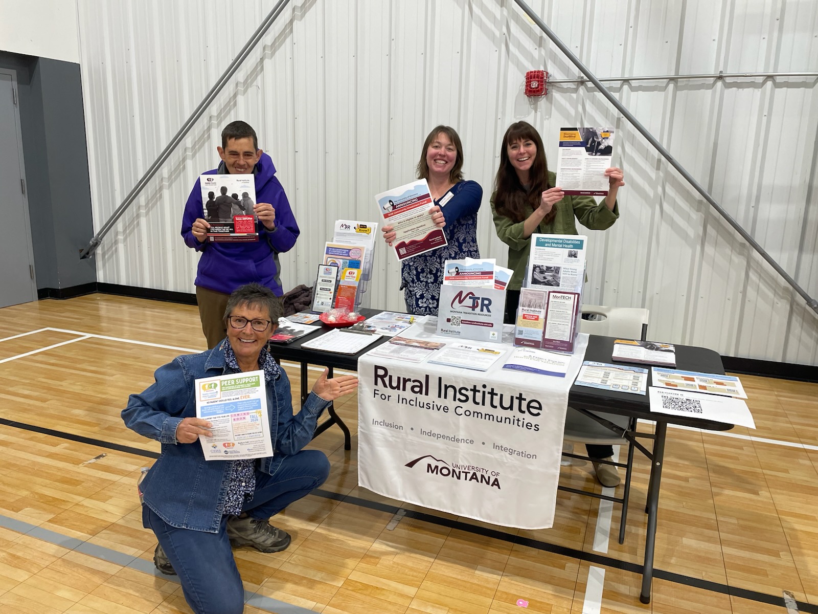 Kari Tarter tables at the Navigating the Road to Life Transition Fair 