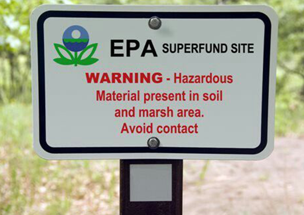 EPA Sign - Warning Hazardous Material Present in Soil and Marsh Area. Avoid Contact