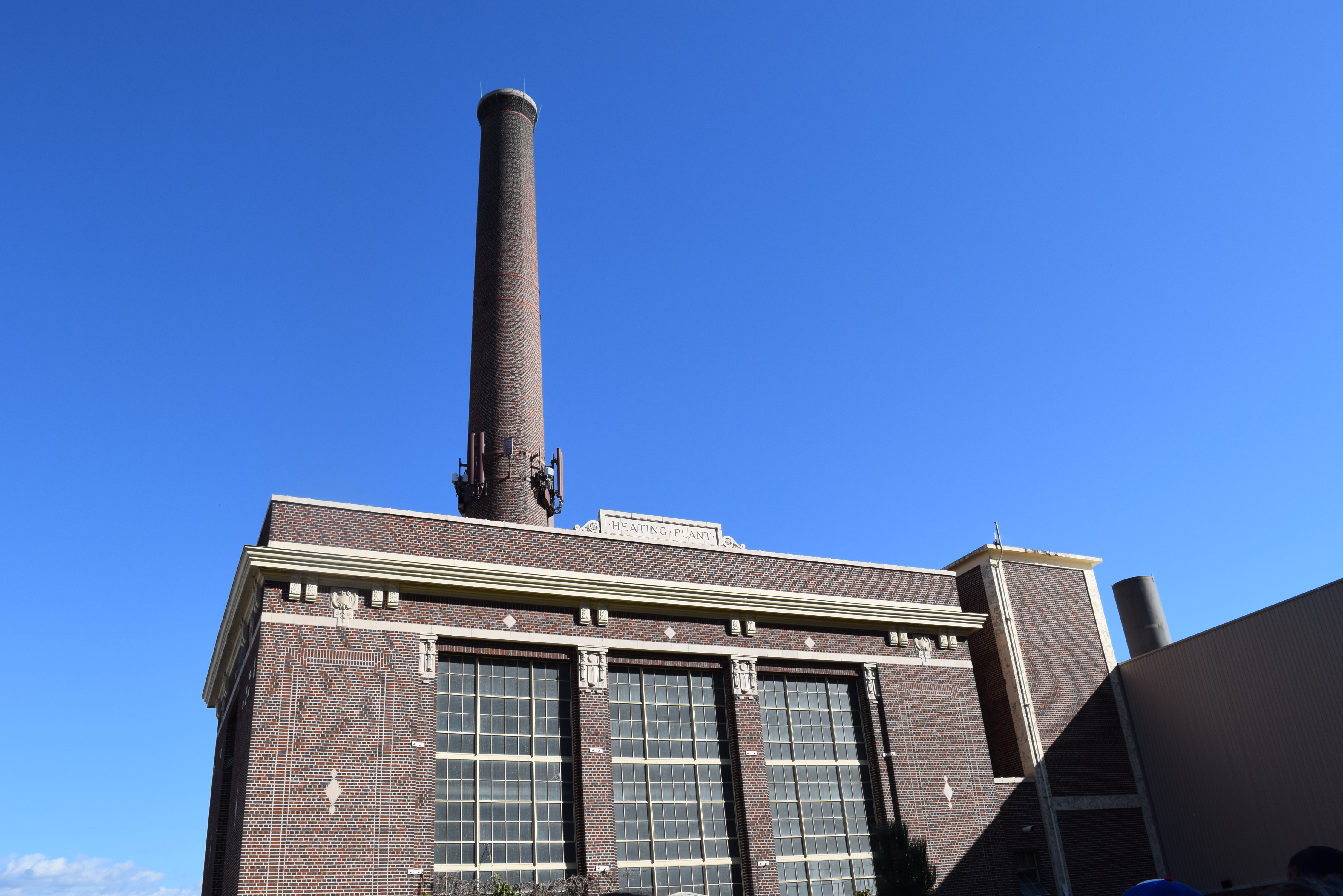 combined heating and power plant smoke stack in sun