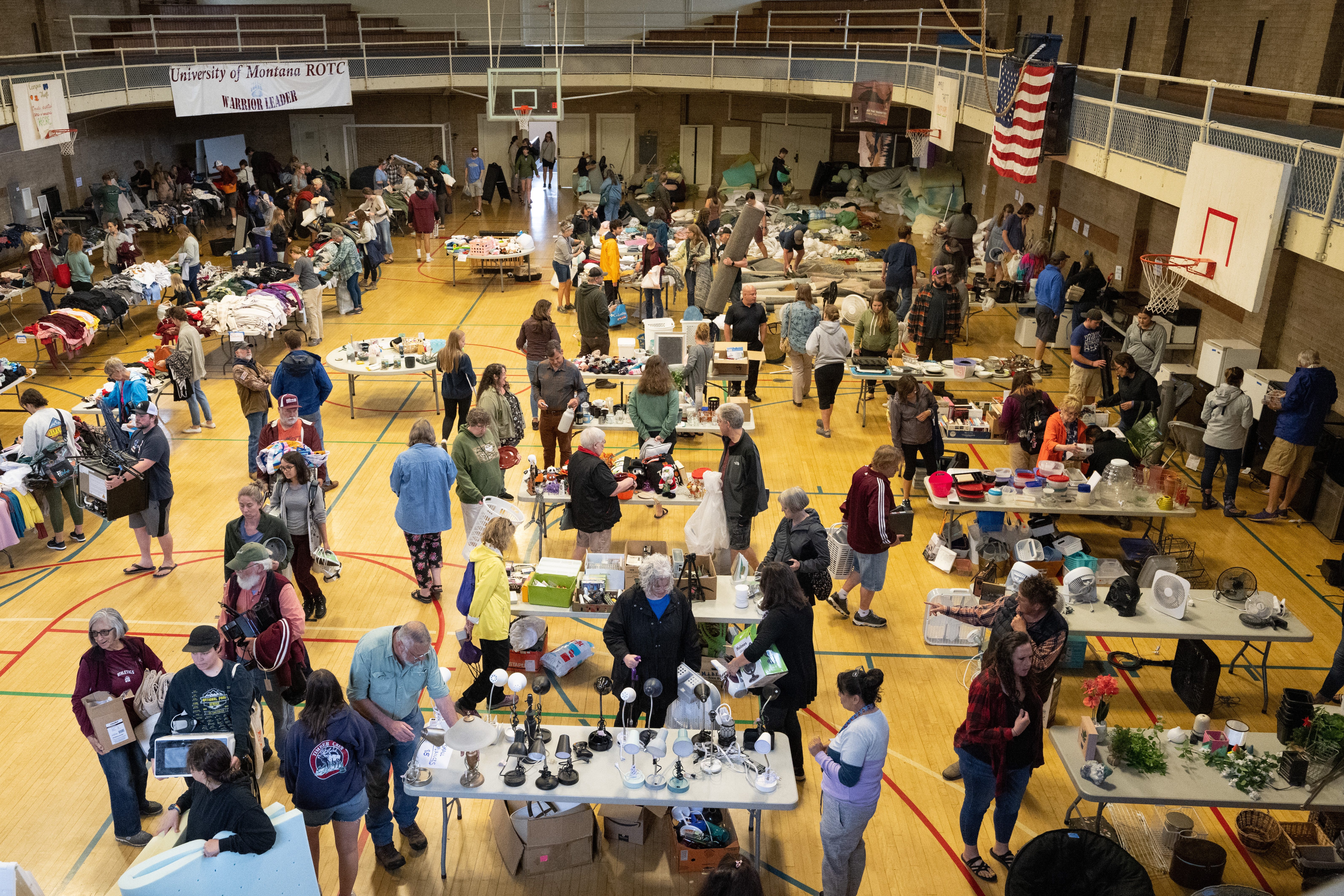 a large amount of people pile in schreiber gym for the sale