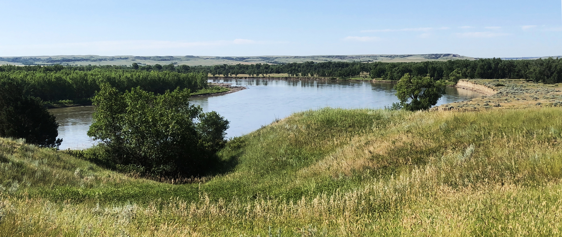 The Missouri River flows near its confluence with the Yellowstone. (Photo by Rick and Susie Graetz)