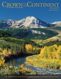 magazine cover featuring a snowy mountain in front of a river and trees with fall colors