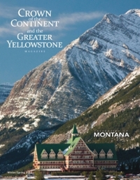 magazine cover featuring a large ornate building in front of a steep snowy mountain
