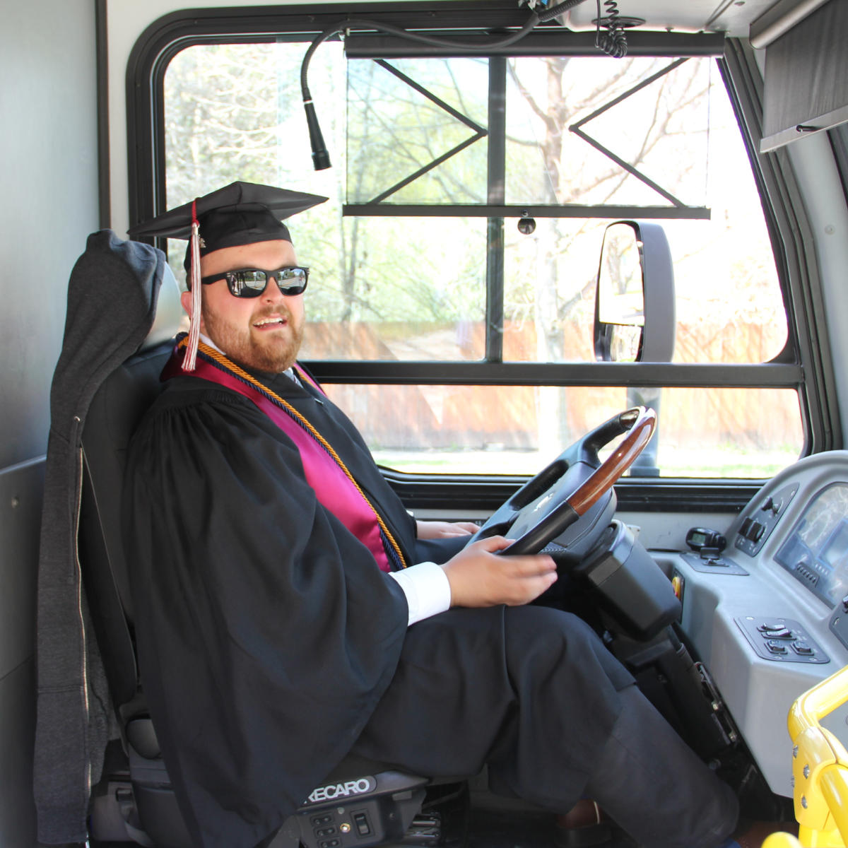 Graduating senior driving UDASH Bus