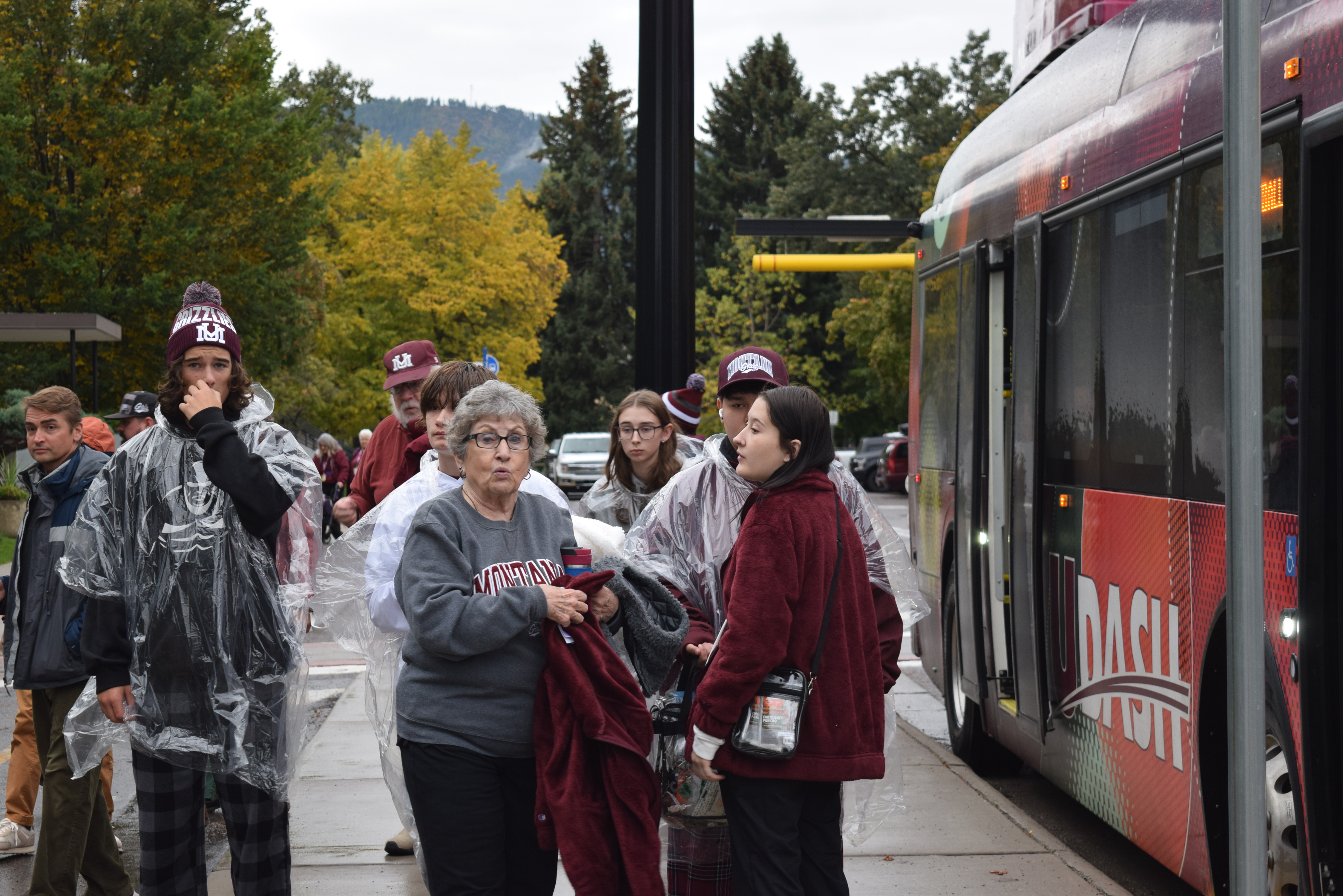 football fans getting off the UDASH football shuttle