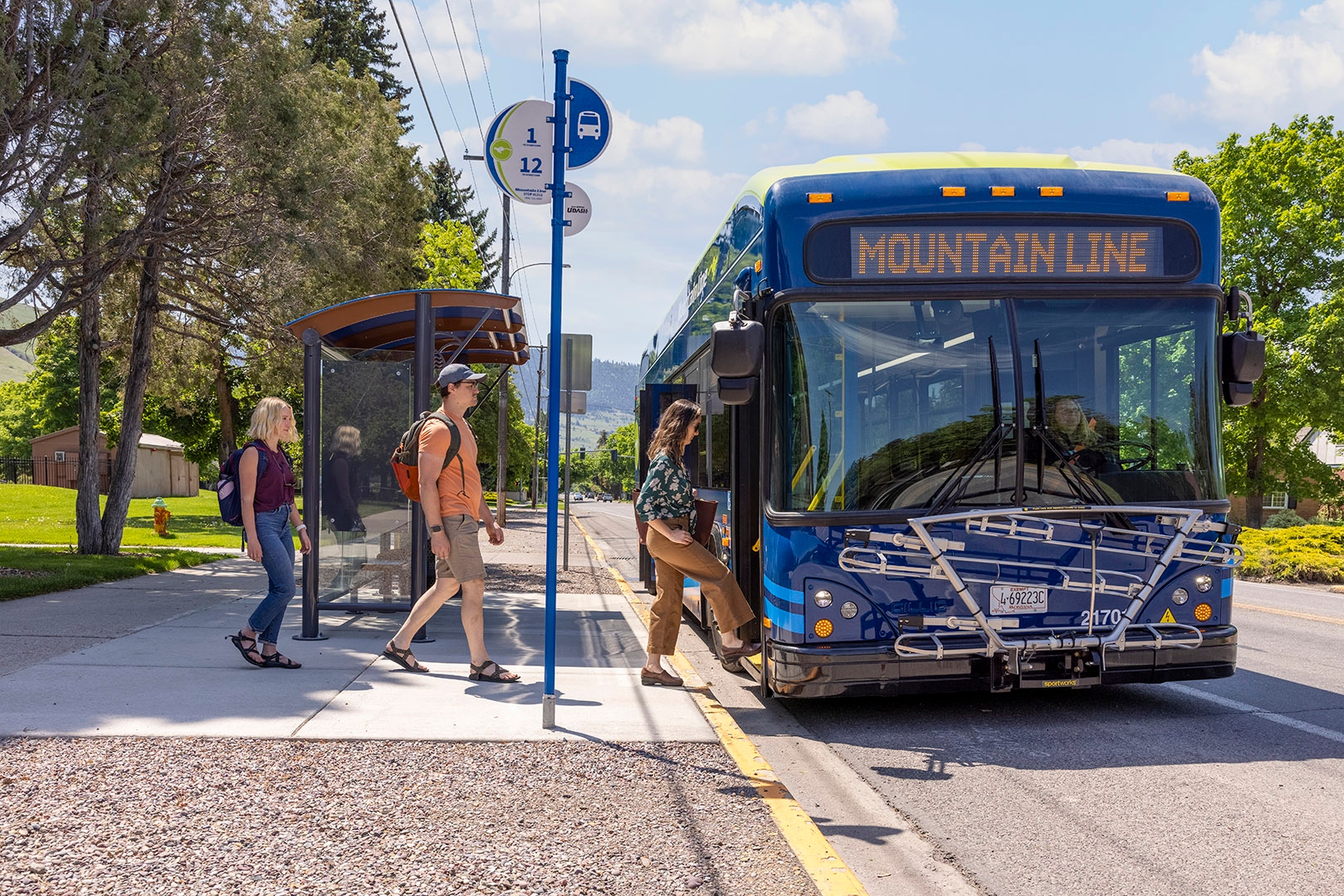 people boarding the mountain line bus