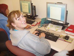 Student working on computer.