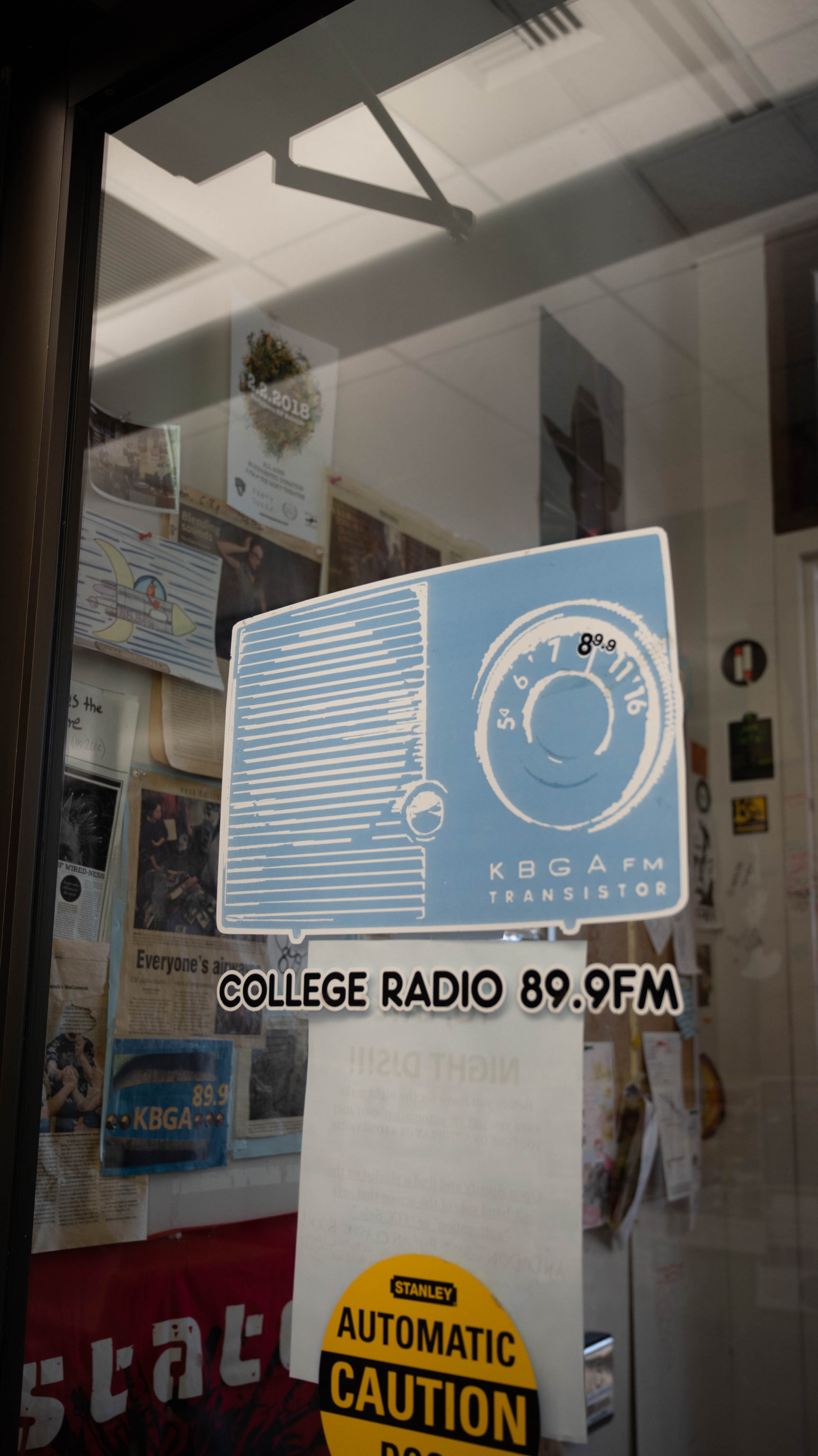Sign of the KGBA door with their logo