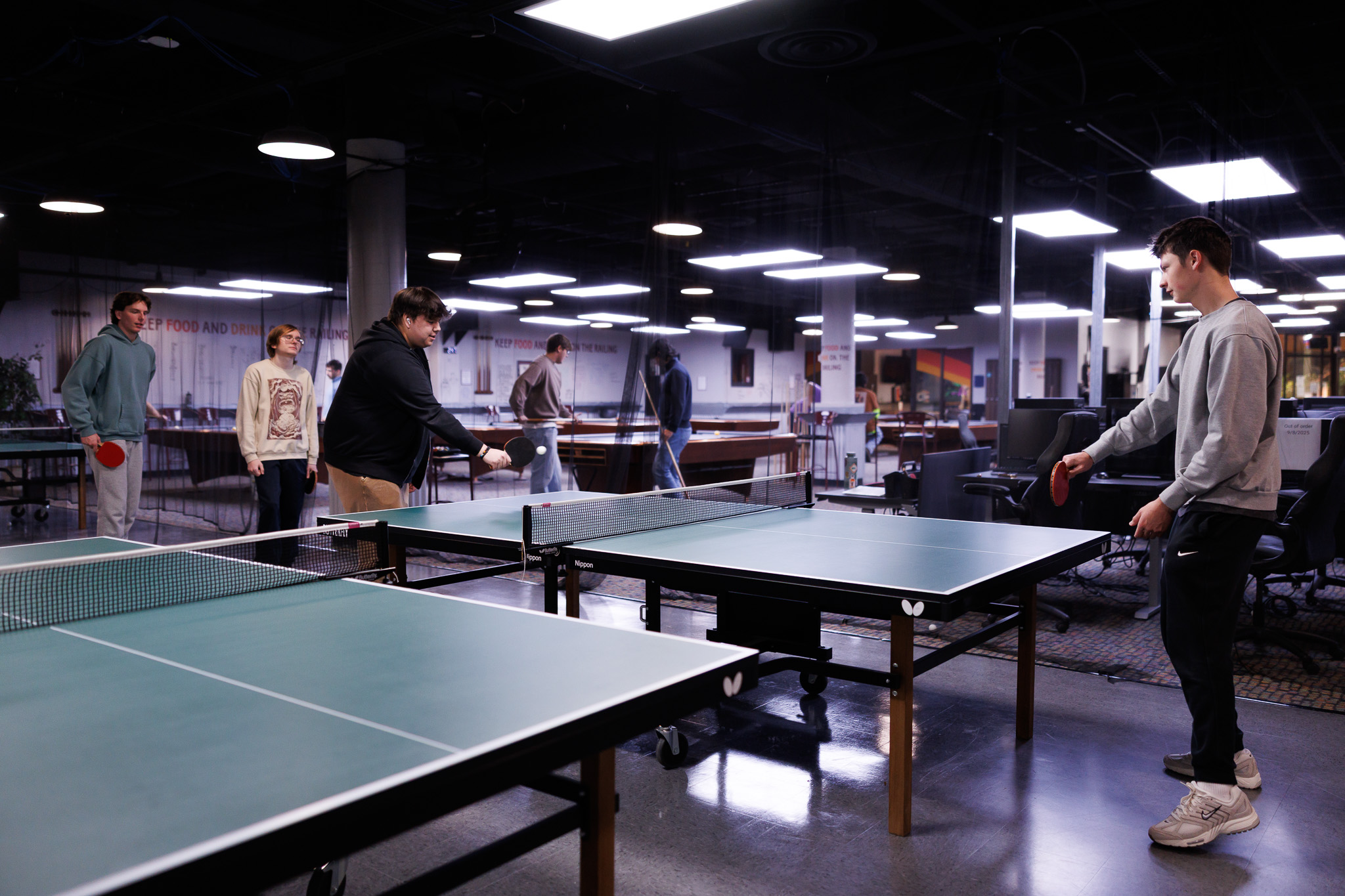 Men playing table tennis 