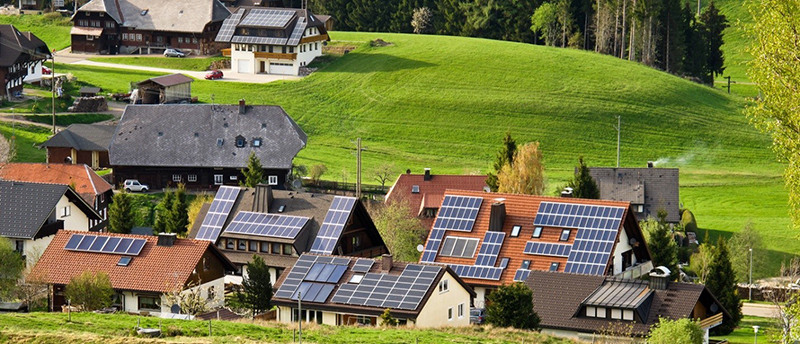 soalr powered houses on a hillside